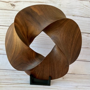 Quadruple-folded Möbius Strip-like Walnut Wood Carving, 10" diameter | Mathematical abstract sculpture | Minimal Surface Geometric Wood Art