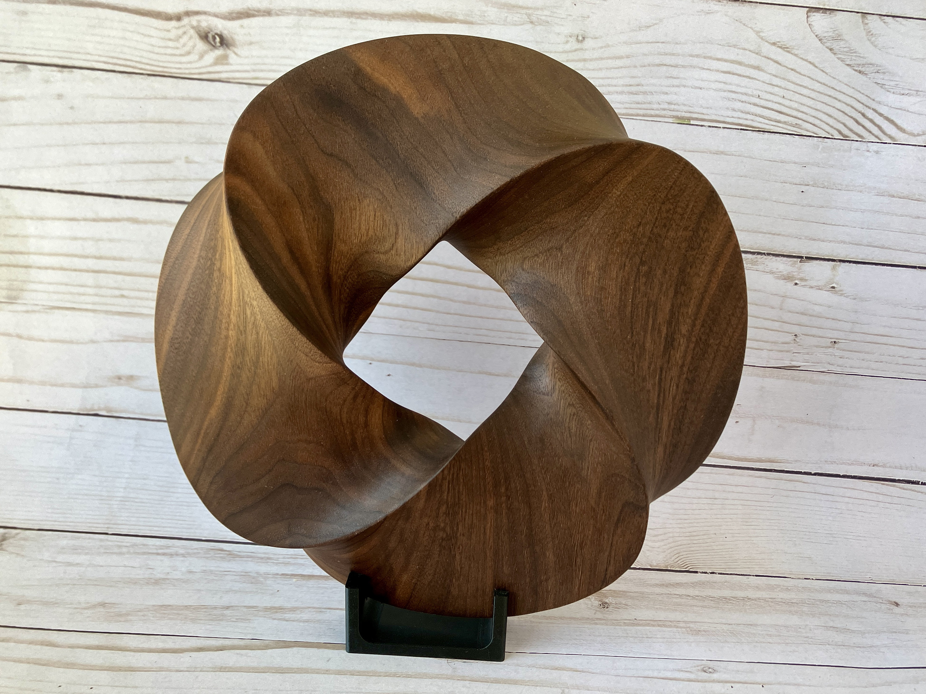 Quadruple-folded Möbius Strip-like Walnut Wood Carving, 10" diameter | Mathematical abstract sculpture | Minimal Surface Geometric Wood Art