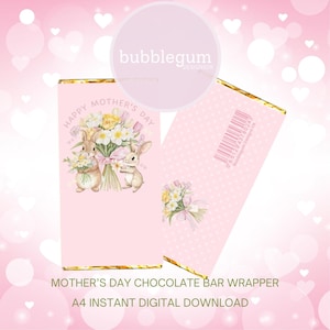 May include: Printable Mother's Day chocolate bar wrapper featuring two bunnies holding a bouquet of flowers. The wrapper is pink with gold accents and the text "Happy Mother's Day".