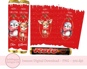 May include: Two red and gold Christmas candy bar wrappers with a white background. The wrappers feature a penguin and a deer with the text "Merry Christmas" and the names "Chloe" and "Bethany". A chocolate candy bar with the text "ROLO" is also included.