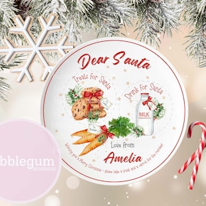 May include: A Christmas-themed ceramic plate with illustrations of cookies, milk, and carrots. The plate has the text "Dear Santa" and "Love from Amelia." The design includes candy canes. The plate is designed for treats for Santa.