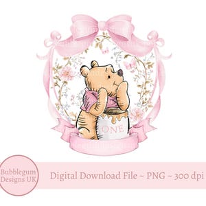May include: A watercolor illustration of a bear wearing a pink shirt, leaning against a honey pot with the word "ONE". The bear is surrounded by a pink ribbon and floral design, with a pink bow at the top. The image has the text "Digital Download File ~ PNG ~ 300 dpi".