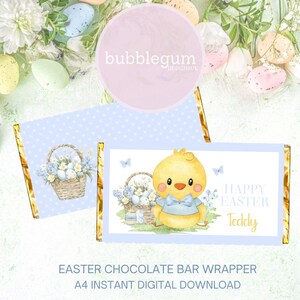 May include: Printable Easter chocolate bar wrapper featuring a cute cartoon chick holding a basket of Easter eggs. The wrapper is blue with white polka dots and gold trim. The text "Happy Easter Teddy" is printed on the wrapper.