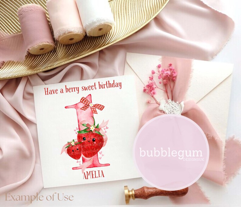 May include: A birthday card with the text "Have a berry sweet birthday" and the name "Amelia". The card features a watercolor illustration of a number one with strawberry details. Pink ribbons and a pink circle with text are also present.