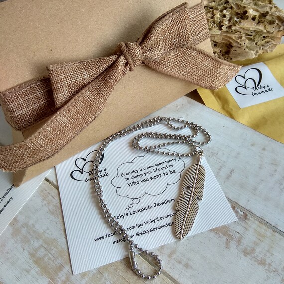 Metal feather necklace deals