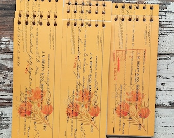 Check notepad; 1930's, used check, yellow