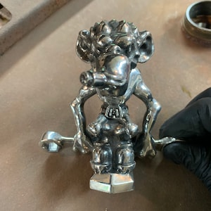 Knuckle Dragger, All METAL, Rat Rod / Hot Rod Hood Ornament. Crabby expression ready to fix your crap, Classic Style. BAD MONKEY series
