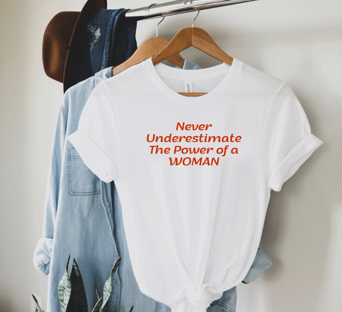 never underestimate the power of a woman t shirt