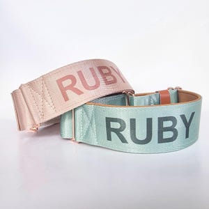 two name dog collars with the name "RUBY" printed on them.
