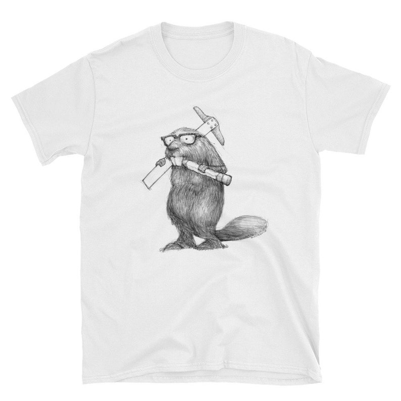 May include: White t-shirt featuring a pencil sketch of a beaver wearing glasses and holding a pickaxe and a rolled-up blueprint. The beaver has a detailed fur texture and is standing upright. The design is centered on the shirt.