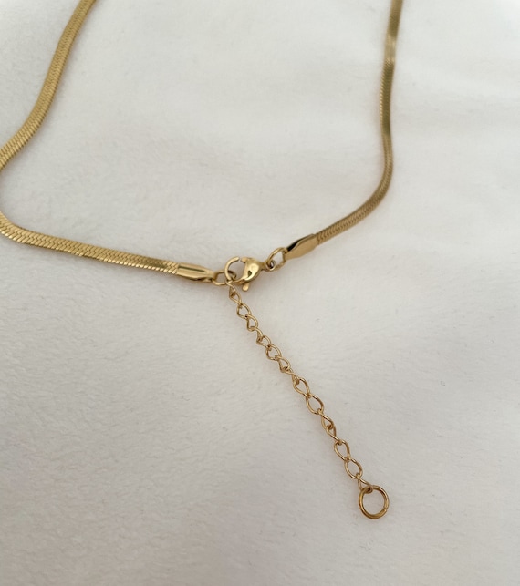 STAINLESS STEEL GOLD SNAKE NECKLACE .
