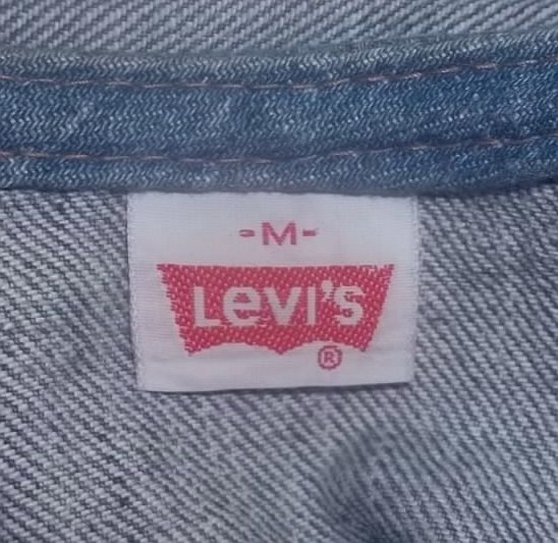 Vintage Levis trucker denim vest snap button front model