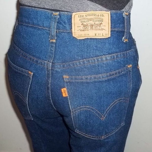 Levis bell bottom jeans model 649 blue denim dark indigo 28x31.5 slightly worn very good laundered collectible new LOWERED PRICE