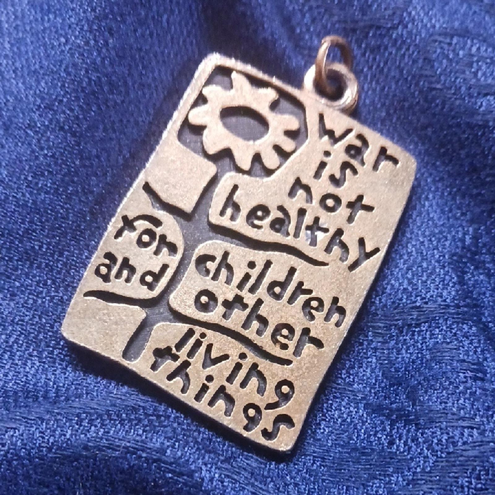 War is Not Healthy Pendant - Etsy