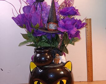 Halloween cat centerpiece with multicolored light