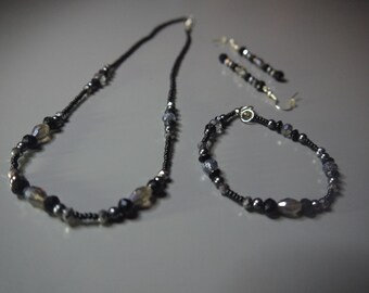 Collier, boucles d'oreilles, bracelet (parure Black Beauty)