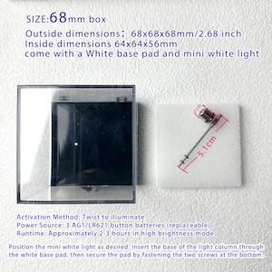 May include: A clear plastic box with a white base pad and a mini white light. The box dimensions are 2.68 inches. The light is 5.1 cm long and 1 cm wide. The text on the image says "SIZE: 68mm box".