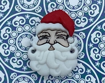 Santa head needle minder