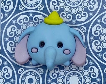 Elephant head needle minder