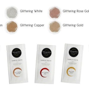 May include: Eight sample packets of glitter paste in various colors, including strawberry, magnolia green, white, rose gold, copper, gold, and black. Each packet has a label that says "Magnolia Cosmetics" and "Sample Paste".