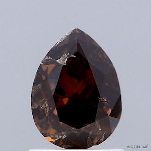 1.05 Carat Natural Fancy Dark Orangy Brown color Diamond ,Pear Modified Brilliant Cut Diamond , i3 Clarity , For jewellery
