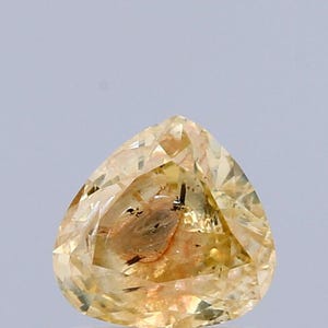 1.03 Carat Natural Fancy yellowish orange  color Diamond ,Heart Modified Brilliant Cut Diamond , i3 Clarity , For jewellery