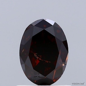 1.33 Carat Natural Fancy Dark Orangy Brown color Diamond ,Oval Modified Brilliant Cut Diamond , i2 Clarity , For jewellery