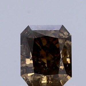 1.03 Carat Natural Fancy Dark yellow Brown color Diamond ,Radiant Modified Brilliant Cut Diamond , i3 Clarity , For jewellery
