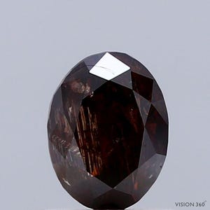 1.20 Carat Natural Fancy Dark Orangy Brown color Diamond ,Oval Modified Brilliant Cut Diamond , i3 Clarity , For jewellery