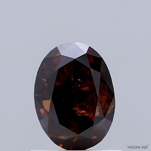1.47 Carat Natural Fancy Dark Orangy Brown color Diamond ,Oval Modified Brilliant Cut Diamond , i3 Clarity , For jewellery