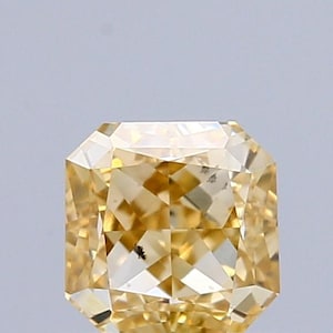 0.77 Carat Natural Fancy Deep Yellow color Diamond ,Square Radiant Modified Brilliant Cut Diamond , Vs1 Clarity , for jewellery