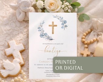 May include: A white baptism invitation card featuring a gold cross and blue eucalyptus leaves. The text reads Acompáñanos a ser parte del bautizo, Carlos F, el sábado 21 de abril, padrinos, calle, recepción 4:00pm. A green box displays PRINTED OR DIGITAL.