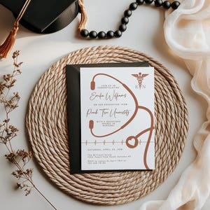 a white and black wedding suite on a rope