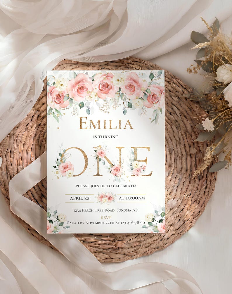 May include: A rectangular birthday invitation card featuring a watercolor floral border of pink and white roses with green leaves. The text reads EMILIA IS TURNING ONE, PLEASE JOIN US TO CELEBRATE, APRIL 22 AT 10:00AM, 1234 PEACH TREE ROAD, SONOMA AD, RSVP SARAH BY NOVEMBER 22TH AT 123-456-78-90.