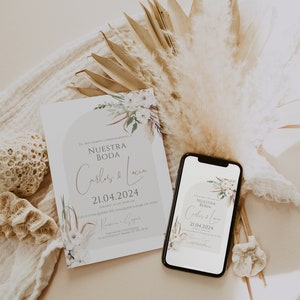 May include: A rectangular wedding invitation card and a smartphone displaying the same invitation design. The design features the text "NUESTRA BODA", "Carlos & Lucia", and "21.04.2024" with floral illustrations in muted earth tones and beige.