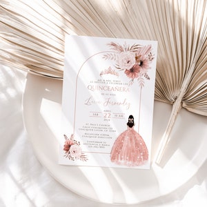 May include: A pink and white quinceañera invitation with a floral design. The invitation includes the text "MR. & MRS. PEREZ LE INVITAN A CELEBRAR LOS QUINCEAÑERA DE SU HIJA Loren Fermoley SAB ABRIL 22 10 AM 202X ST. PAUL'S CHURCH CALLE CUALQUIERA 123 CUALQUIER LUGAR, CP: 12345 RECEPCIÓN 4:00PM CUALQUIER DIRECCIÓN CONFIRMAR SU ASISTENCIA A MARIA 123-456-7890".