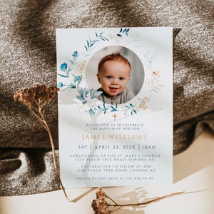 May include: Baptism invitation featuring a smiling baby in a circular frame, surrounded by a watercolor floral wreath. The invitation includes the name James Williams, date, time, and location details.