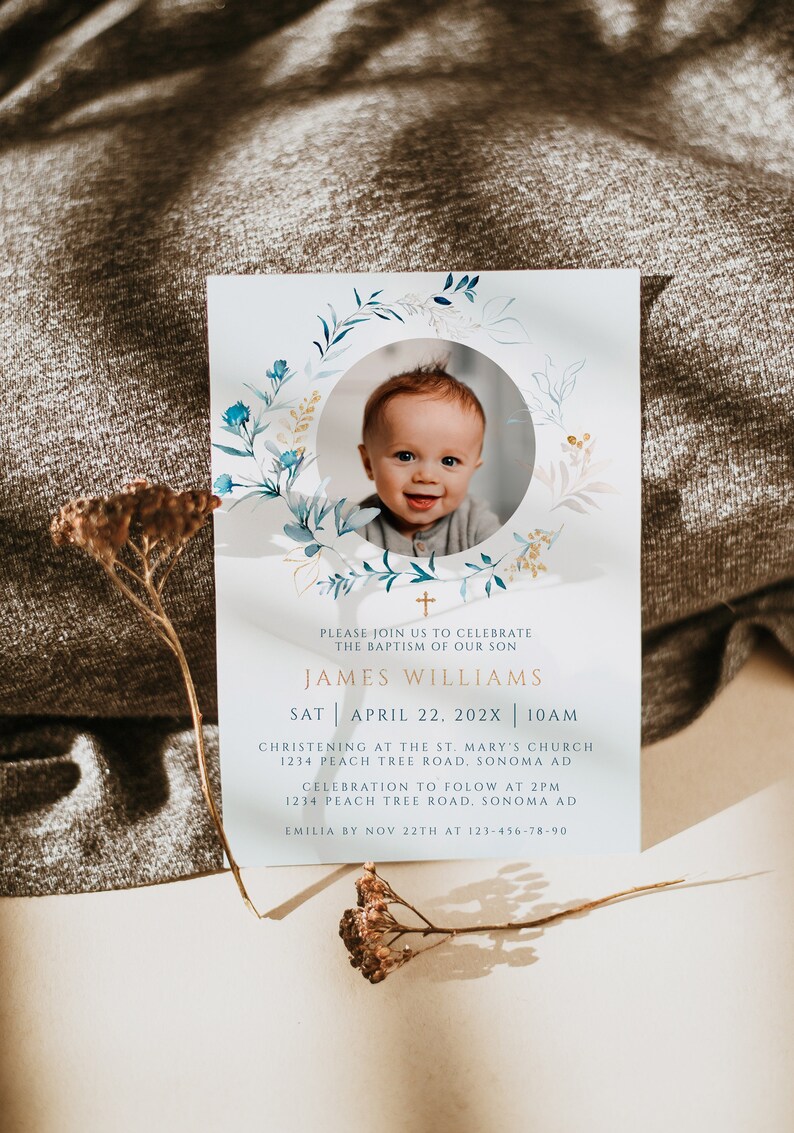 May include: Baptism invitation featuring a smiling baby in a circular frame, surrounded by a watercolor floral wreath. The invitation includes the name James Williams, date, time, and location details.