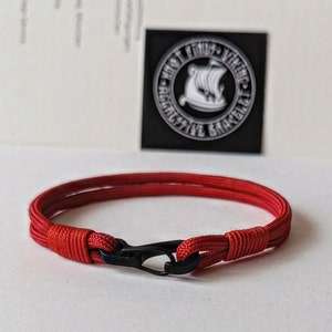 Thin legendary red paracord and carabiner bracelet.  Unloading camp.  Surfer bangle. Extreme durable.