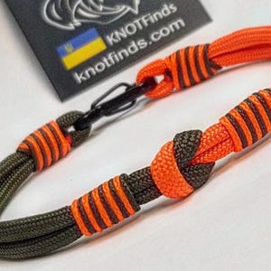 Bracelet mousqueton orange et vert en paracorde : jonc Adventure Rope