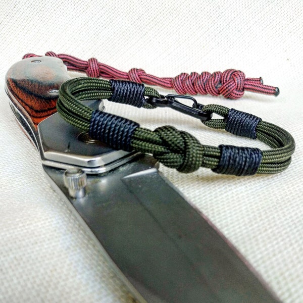 Brazalete de campamento de descarga. Brazalete militar fino. Brazalete de cuerda. Estilo militar.