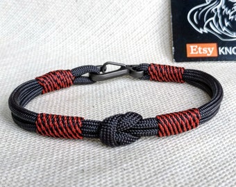 Handmade paracord bracelet made of Celtic knots, carbine and paracord.  Nordic viking style.