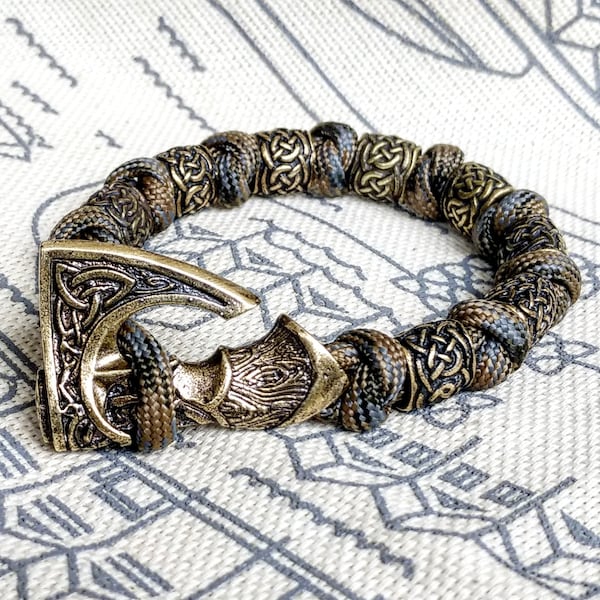 Wikinger Armband aus Paracord, keltische Knoten und orginelle Perlen aus Messing mit dem Abbild uralter skandinavischer Muster. Herren Stil.