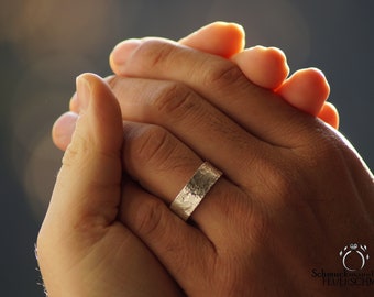 Silver ring with textured surface