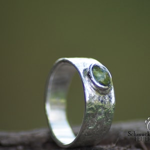 Silver ring with peridot
