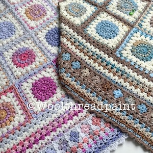 May include: Two crocheted blankets, one in a pink and purple colour scheme and the other in a blue and brown colour scheme. Both blankets feature a square pattern with a central circle motif. The blankets are laid out on a white surface. The text "Woolthreadpaint" is visible in the bottom right corner of the image.