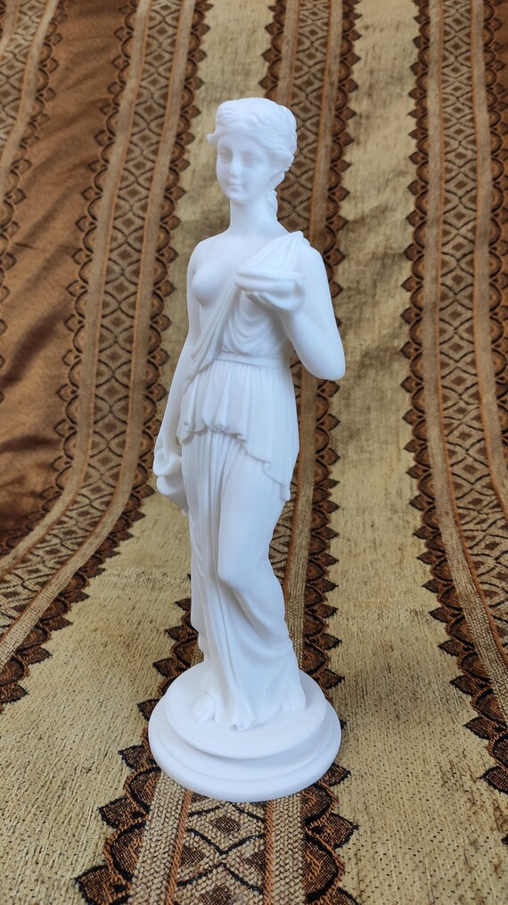 Ancient Greek cupbearer Hebe sculpture alabaster statue aged artifact Ancient Greek cupbearer Hebe sculpture alabaster statue aged artifact