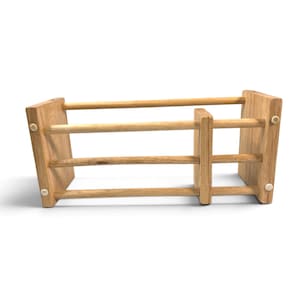 May include: A light brown wooden rack featuring two vertical side panels and one central divider connected by three horizontal dowels. The structure has small circular white protective pads attached to the corners of the side panels.