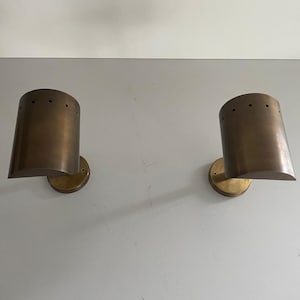 Mid-century Cylindrical Brass Pair of Sconces with antique finish, 1950s, Italy
