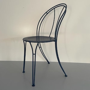 Unusual design Dark Blue metal Chair with arch-shaped Backside